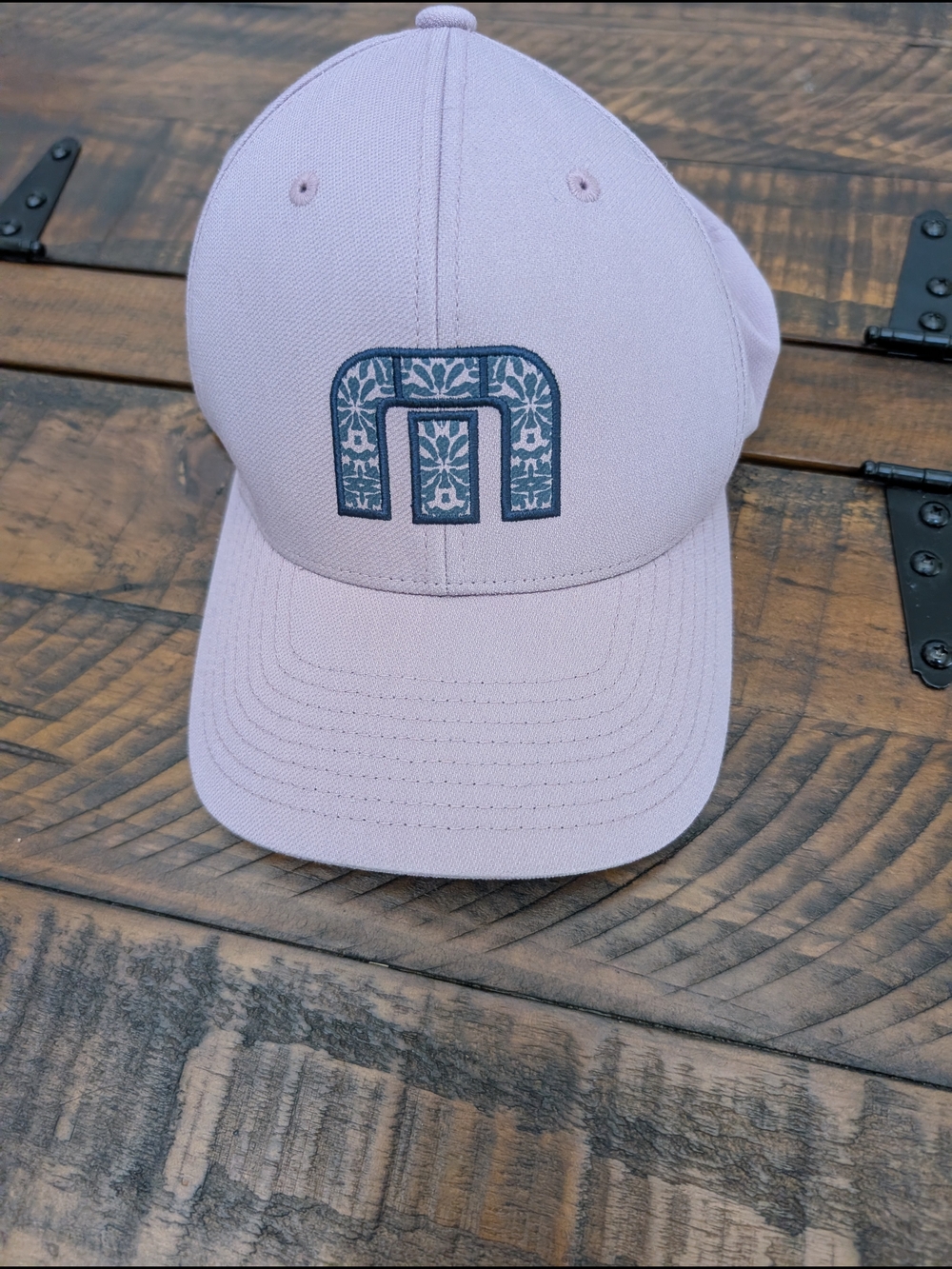 Travis Mathew Women's Light Pink Baseball Cap with Navy Logo